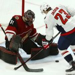 Arizona Coyotes goaltender Adin Hill (31) makes a save on a shot by Washington Capitals right wing Dmitrij Jaskin (23) during the third period of an NHL hockey game Thursday, Dec. 6, 2018, in Glendale, Ariz. The Capitals won 4-2. (AP Photo/Ross D. Franklin)