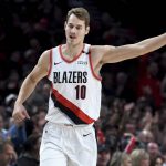 Portland Trail Blazers forward Jake Layman reacts after hitting a three-point basket during the first half of an NBA basketball game against the Phoenix Suns in Portland, Ore., Thursday, Dec. 6, 2018. (AP Photo/Steve Dykes)