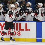 Arizona Coyotes forward Christian Fischer (36) celebrates his goal during the first period of an NHL hockey game against the Buffalo Sabres, Thursday, Dec. 13, 2018, in Buffalo N.Y. (AP Photo/Jeffrey T. Barnes)