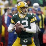 Green Bay Packers quarterback Aaron Rodgers looks to pass the ball during the first half of an NFL football game against the Arizona Cardinals, Sunday, Dec. 2, 2018, in Green Bay, Wis. (AP Photo/Mike Roemer)