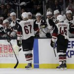 Arizona Coyotes' Lawson Crouse (67) celebrates his goal with teammates during the first period of an NHL hockey game against the Los Angeles Kings Tuesday, Dec. 4, 2018, in Los Angeles. (AP Photo/Marcio Jose Sanchez)