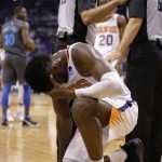 Phoenix Suns center Deandre Ayton reacts after getting fouled in the second half during an NBA basketball game against the Dallas Mavericks, Thursday, Dec. 13, 2018, in Phoenix. Phoenix defeated Dallas 99-89. (AP Photo/Rick Scuteri)