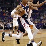 Los Angeles Clippers forward Tobias Harris (34) drives during the first half of an NBA basketball game against the Phoenix Suns, Monday, Dec. 10, 2018, in Phoenix. (AP Photo/Matt York)
