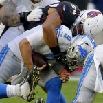 Detroit Lions quarterback Matthew Stafford (9) is sacked by Arizona Cardinals defensive end Cameron Malveaux (94) during the first half of NFL football game, Sunday, Dec. 9, 2018, in Glendale, Ariz. (AP Photo/Rick Scuteri)