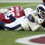 Los Angeles Rams running back C.J. Anderson (35) falls into the end zone for a touchdown against the Arizona Cardinals during the first half of an NFL football game, Sunday, Dec. 23, 2018, in Glendale, Ariz. (AP Photo/Ross D. Franklin)