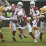 Arizona Cardinals running back David Johnson (31) rushes past Green Bay Packers defenders during the first half of an NFL football game Sunday, Dec. 2, 2018, in Green Bay, Wis. (AP Photo/Mike Roemer)