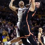 Arizona State guard Rob Edwards, left, drives to the basket as Princeton's Jerome Desrosiers defends during the second half of an NCAA college basketball game, Saturday, Dec. 29, 2018, in Tempe, Ariz. (AP Photo/Ralph Freso)