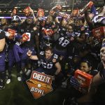 TCU players celebrate a 10-7 overtime win against California in the Cheez-It Bowl NCAA college football game Wednesday, Dec. 26, 2018, in Phoenix. (AP Photo/Ross D. Franklin)