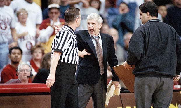 Arizona State head coach Bill Frieder vehemently argues with an unidentified official over a call a...