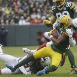 Green Bay Packers wide receiver Davante Adams is hit by Arizona Cardinals strong safety Budda Baker after making a catch during the first half of an NFL football game Sunday, Dec. 2, 2018, in Green Bay, Wis. (AP Photo/Mike Roemer)