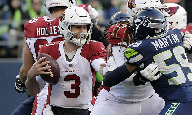 Arizona Cardinals quarterback Josh Rosen (3) starts to back out of the pocket during the second hal...