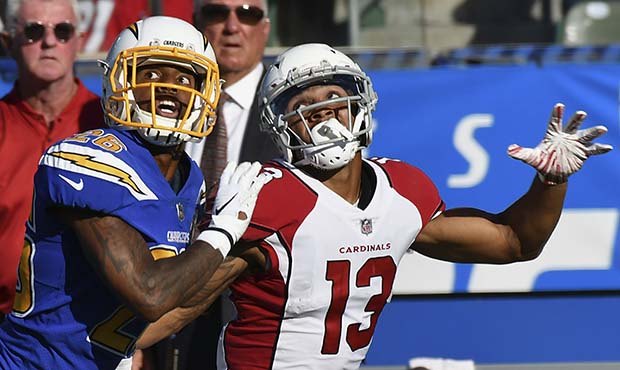 Arizona Cardinals wide receiver Christian Kirk (13) and Los Angeles Chargers cornerback Casey Haywa...
