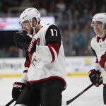 Arizona Coyotes' Alex Galchenyuk (17) and Clayton Keller (9) celebrate after scoring against the San Jose Sharks in the first period of an NHL hockey game in San Jose, Calif., Sunday, Dec. 23, 2018. (AP Photo/Josie Lepe)