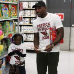 Arizona Cardinals’ Patrick Peterson doubles checks the wish list during the cornerback’s “Shop with a Jock” event on December 17, 2018, in Tempe, Ariz. (Tyler Drake/Arizona Sports)