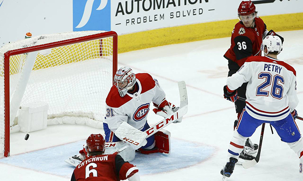 Montreal Canadiens goaltender Carey Price (31) gives up a goal to Arizona Coyotes' Oliver Ekman-Lar...