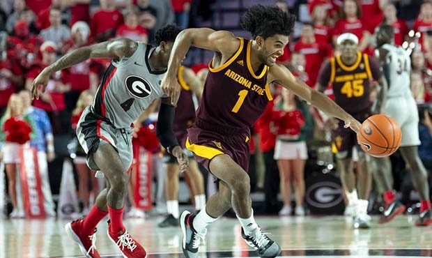 Arizona State guard Remy Martin (1) turns up the floor after stealing the ball from Georgia guard T...