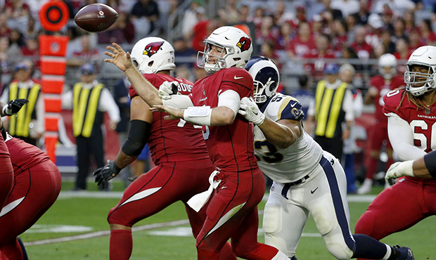 Arizona Cardinals quarterback Josh Rosen (3) gets the throw off as Los Angeles Rams wide receiver J...
