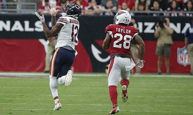 Chicago Bears wide receiver Allen Robinson (12) makes a catch as he gets past Arizona Cardinals def...