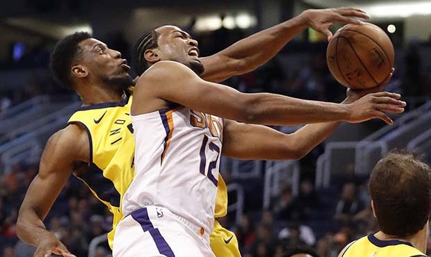 Phoenix Suns forward T.J. Warren (12) is fouled by Indiana Pacers forward Thaddeus Young during the...