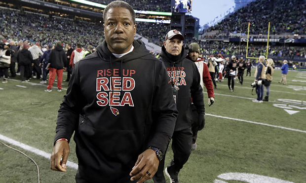 Arizona Cardinals head coach Steve Wilks walks off the field after an NFL football game against the...