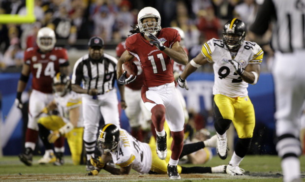 Arizona Cardinals wide receiver Larry Fitzgerald (11) breaks away from Pittsburgh Steelers cornerba...