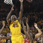 Arizona State forward Zylan Cheatham (45) scores against Arizona guard Justin Coleman, front right, and center Chase Jeter during the second half of an NCAA college basketball game Thursday, Jan. 31, 2019, in Tempe, Ariz. Arizona State won 95-88 in overtime. (AP Photo/Ross D. Franklin)