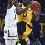 Arizona State's Luguentz Dort, right, shoots against California's Darius McNeill (1) during the first half of an NCAA college basketball game Wednesday, Jan. 9, 2019, in Berkeley, Calif. (AP Photo/Ben Margot)