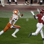 Alabama's Jerry Jeudy catches a pass in front of Clemson's A.J. Terrell during the second half of the NCAA college football playoff championship game, Monday, Jan. 7, 2019, in Santa Clara, Calif. (AP Photo/Jeff Chiu)