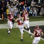 Alabama's Hale Hentges (84) celebrates his touchdown catch during the first half the NCAA college football playoff championship game against Clemson, Monday, Jan. 7, 2019, in Santa Clara, Calif. (AP Photo/Jeff Chiu)