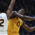 Arizona State guard Luguentz Dort, right, shoots as California's Andre Kelly defends during the first half of an NCAA college basketball game Wednesday, Jan. 9, 2019, in Berkeley, Calif. (AP Photo/Ben Margot)