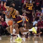 Arizona State forward Kimani Lawrence (14) drives against Stanford guard Cormac Ryan during the first half of an NCAA college basketball game in Stanford, Calif., Saturday, Jan. 12, 2019. (AP Photo/Tony Avelar)