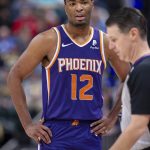 Phoenix Suns forward T.J. Warren (12) reacts after being called for a technical foul during the first half of the team's NBA basketball game against the Indiana Pacers on Tuesday, Jan. 15, 2019, in Indianapolis. (AP Photo/Doug McSchooler)