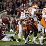Clemson's Travis Etienne reacts after his touchdown during the first half of the NCAA college football playoff championship game against Alabama, Monday, Jan. 7, 2019, in Santa Clara, Calif. (AP Photo/David J. Phillip)