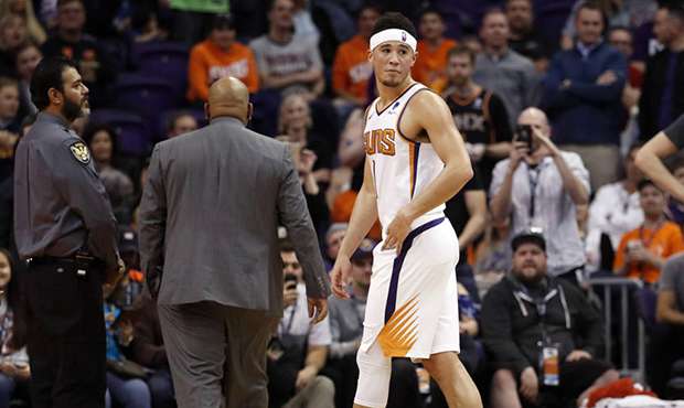 Booker, Dieng fail to tussle in tunnel during blowout of Suns