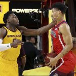 Arizona State guard Luguentz Dort, left, fouls Arizona forward Ira Lee, right, during the second half of an NCAA college basketball game Thursday, Jan. 31, 2019, in Tempe, Ariz. Arizona State won 95-88 in overtime. (AP Photo/Ross D. Franklin)