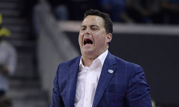 Arizona coach Sean Miller yells to his team during the second half of an NCAA college basketball ga...