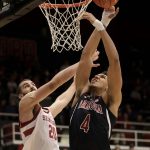Arizona center Chase Jeter (4) shoots against Stanford center Josh Sharma (20) during the first half of an NCAA college basketball game in Stanford, Calif., Wednesday, Jan. 9, 2019. (AP Photo/Jeff Chiu)