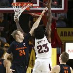 Arizona State forward Romello White (23) shoots over Oregon State forward Kylor Kelley (24) as Oregon State guard Zach Reichle (11) looks on during the first half of an NCAA college basketball game, Thursday, Jan. 17, 2019, in Tempe, Ariz. (AP Photo/Ross D. Franklin)
