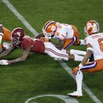 Alabama's DeVonta Smith goes for a loose ball during the second half of the NCAA college football playoff championship game against Clemson, Monday, Jan. 7, 2019, in Santa Clara, Calif. (AP Photo/Jeff Chiu)