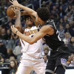 Phoenix Suns forward Kelly Oubre Jr. (3) gets fouled by Sacramento Kings forward Justin Jackson in the second half during an NBA basketball game, Tuesday, Jan. 8, 2019, in Phoenix. Phoenix defeated Sacramento 115-111. (AP Photo/Rick Scuteri)