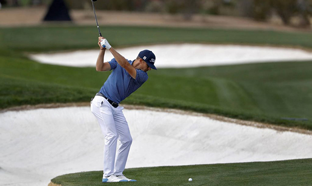 Morgan Hoffman hits from the third fairway during the first round of the Phoenix Open golf tourname...