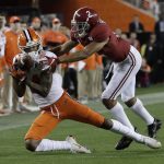 Clemson's Diondre Overton catches a pass in front of Alabama's Patrick Surtain II during the second half of the NCAA college football playoff championship game Monday, Jan. 7, 2019, in Santa Clara, Calif. (AP Photo/David J. Phillip)