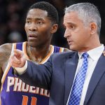 Phoenix Suns head coach Igor Kokoskov, right, talks with Suns guard Jamal Crawford during a timeout in the first half of an NBA basketball game against the San Antonio Spurs, Tuesday, Jan. 29, 2019, in San Antonio. (AP Photo/Darren Abate)