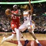 Toronto Raptors forward Pascal Siakam (43) drives to the basket as Phoenix Suns forward Mikal Bridges (25) defends during the first half of an NBA basketball game Thursday, Jan. 17, 2019, in Toronto. (Frank Gunn/The Canadian Press via AP)