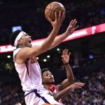 Phoenix Suns guard Devin Booker (1) goes to the basket as Toronto Raptors guard Kyle Lowry defends during the second half of an NBA basketball game Thursday, Jan. 17, 2019, in Toronto. (Frank Gunn/The Canadian Press via AP)