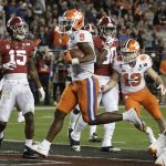 Clemson's Travis Etienne reacts after his touchdown during the first half of the NCAA college football playoff championship game against Alabama Monday, Jan. 7, 2019, in Santa Clara, Calif. (AP Photo/Chris Carlson)
