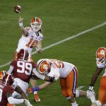 Clemson's Trevor Lawrence throws during the first half of the NCAA college football playoff championship game against Alabama, Monday, Jan. 7, 2019, in Santa Clara, Calif. (AP Photo/Jeff Chiu)