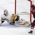 Pittsburgh Penguins goaltender Matt Murray (30) makes a sliding save on a shot by Arizona Coyotes center Clayton Keller (9) during the first period of an NHL hockey game Friday, Jan. 18, 2019, in Glendale, Ariz. (AP Photo/Ross D. Franklin)
