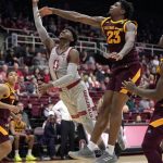 Stanford guard Daejon Davis (1) releases a shot next to Arizona State forward Romello White (23) during the first half of an NCAA college basketball game in Stanford, Calif., Saturday, Jan. 12, 2019. (AP Photo/Tony Avelar)