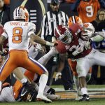 Alabama's Damien Harris is stopped near the goal line during the second half of the NCAA college football playoff championship game against Clemson, Monday, Jan. 7, 2019, in Santa Clara, Calif. (AP Photo/David J. Phillip)